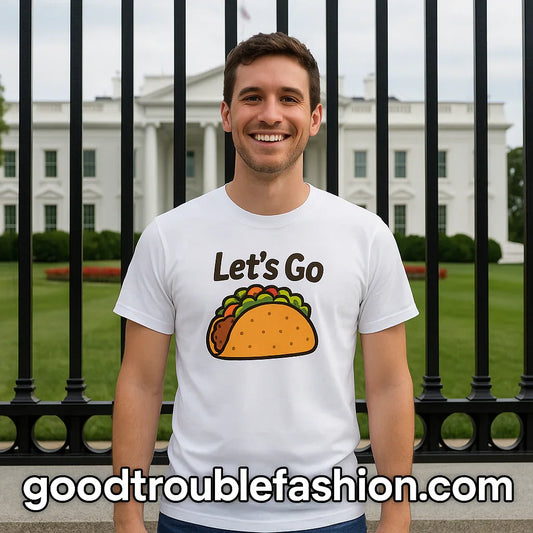 Smiling man wearing a Let's Go taco graphic t-shirt representing the future of LGBTQ street fashion