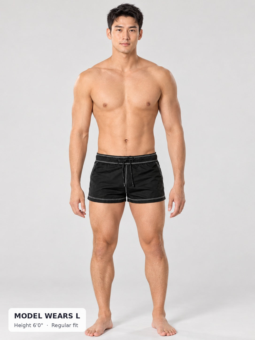 Black CODE 22 Motion Mini Shorts on an athletic model wearing size L, 6'0"