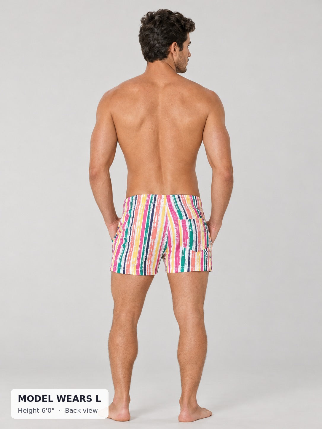 CODE 22 Swim Shorts on an athletic model wearing size L, 6'0", back view