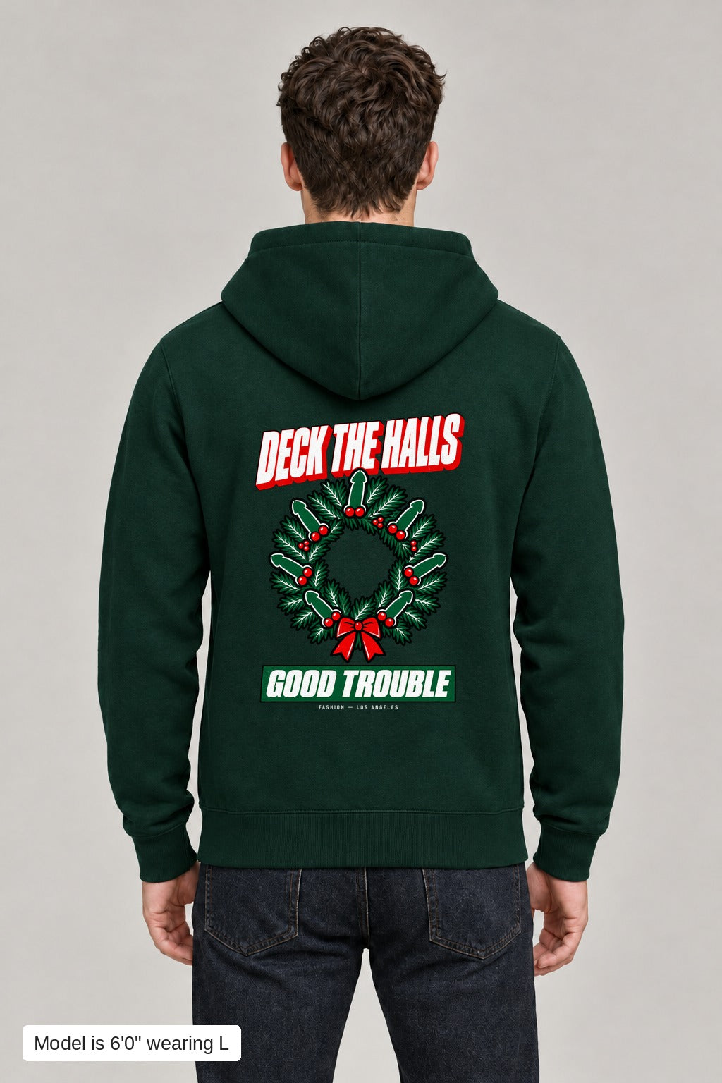 Deck the Halls Hoodie in Green, back view with Street Bold wreath print, model is 6'0" wearing L