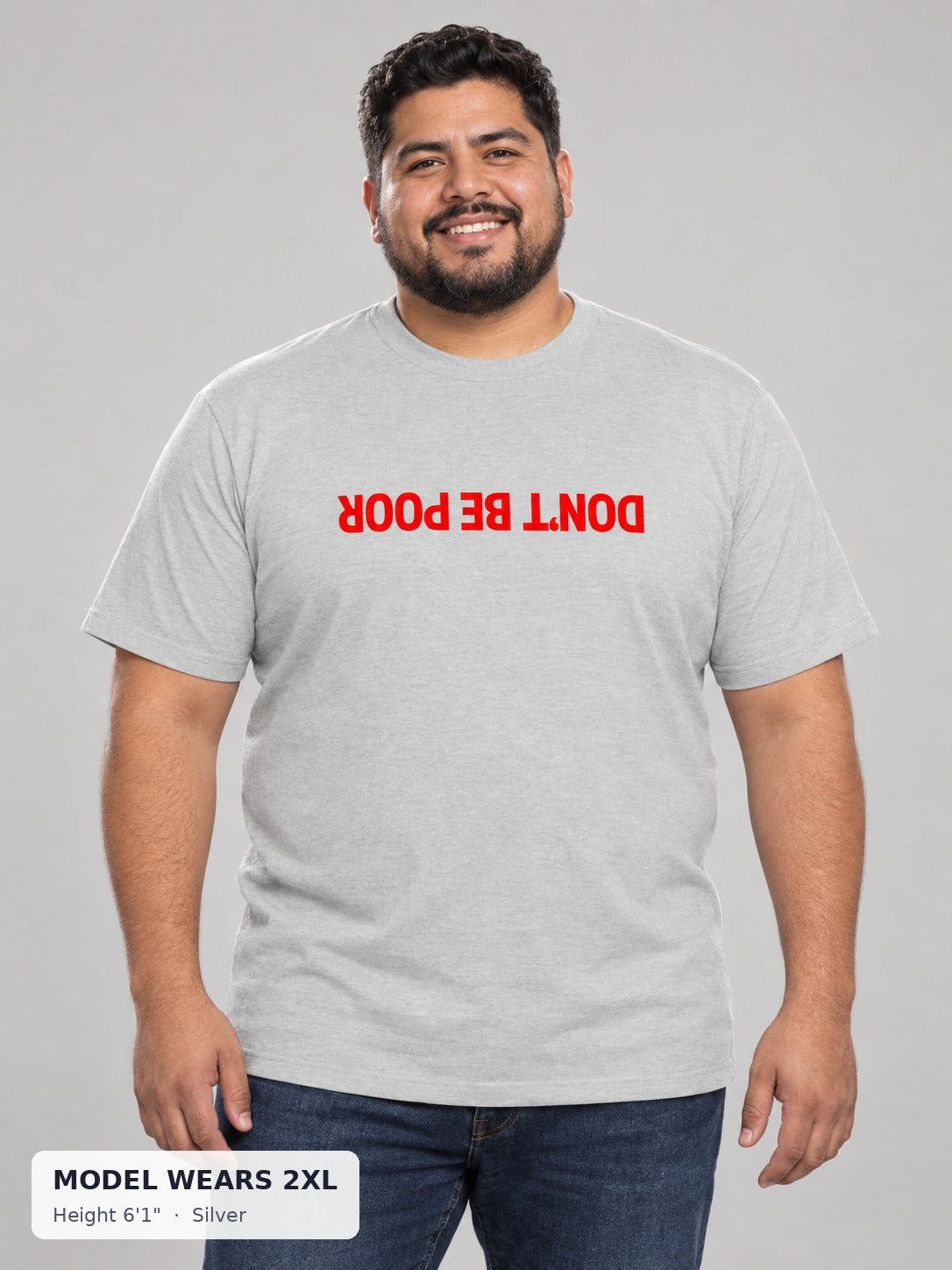 Don't Be Poor Tee in Silver on a plus-size model wearing size 2XL, 6'1" - Good Trouble Fashion