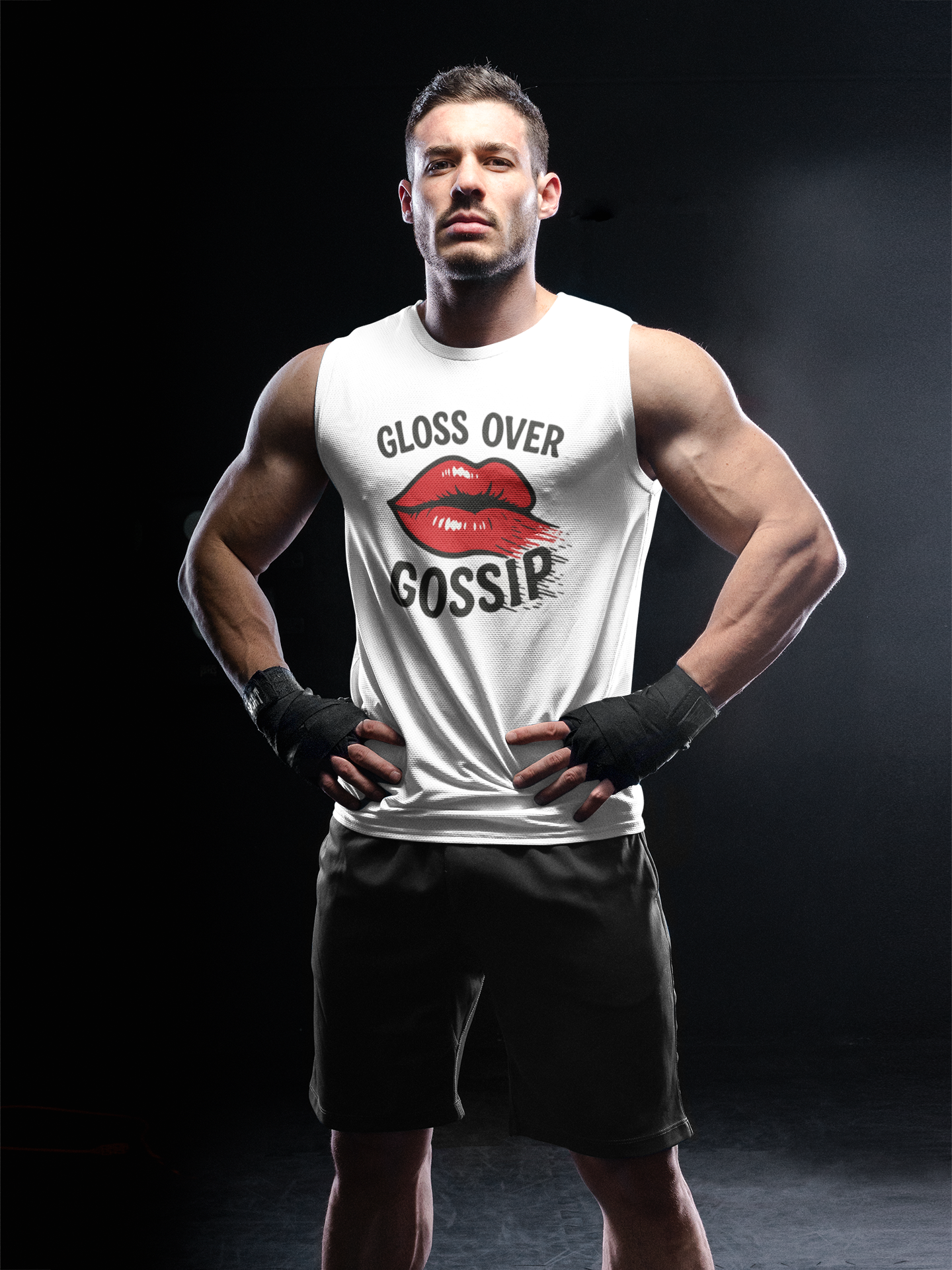 Man wearing white gloss over gossip tee with red lips graphic and black shorts from Good Trouble Garments