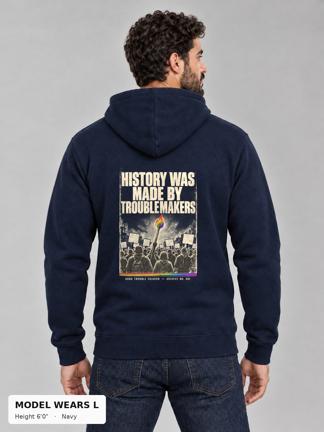 Good Trouble Archive 001 Hoodie in Navy, back view showing the HISTORY WAS MADE BY TROUBLEMAKERS poster back print, on an athletic model wearing size L, 6'0" - Good Trouble Fashion