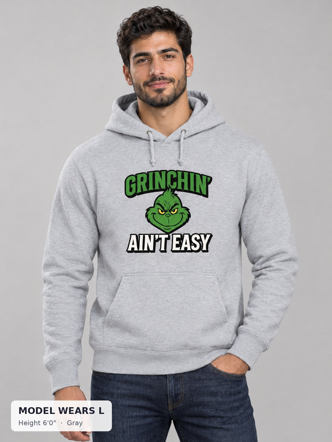 Grinchin' Ain't Easy Hoodie in Gray on an athletic model wearing size L, 6'0" - Good Trouble Fashion