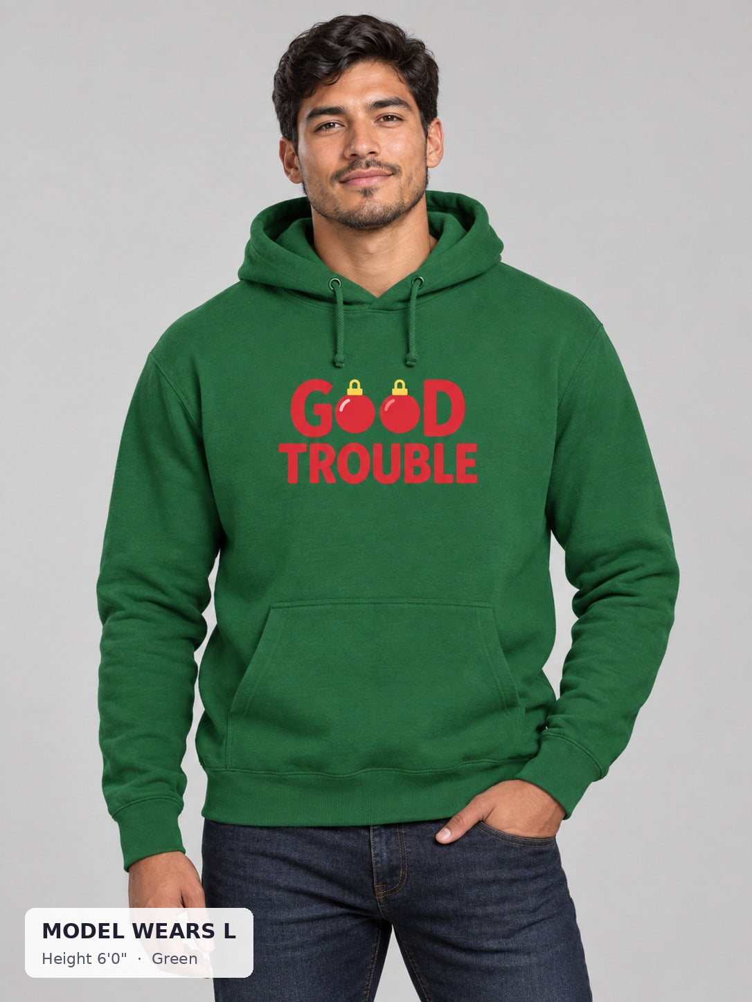 Good Trouble Holiday Hoodie in Green on an athletic model wearing size L, 6'0" - Good Trouble Fashion
