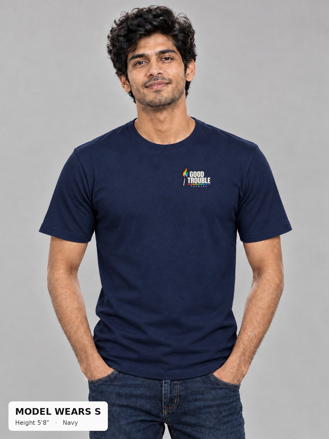 Good Trouble Spark Tee in Navy, front view showing the left-chest match logo, on a slim model wearing size S, 5'8" - Good Trouble Fashion