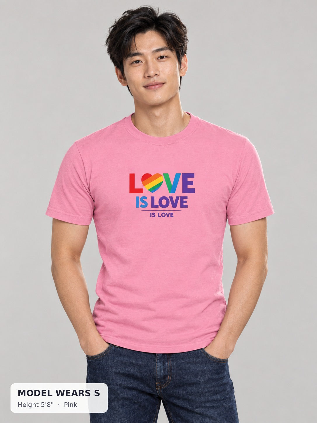 Love Is Love Rainbow Heart Tee in Pink on a slim model wearing size S, 5'8" - Good Trouble Fashion