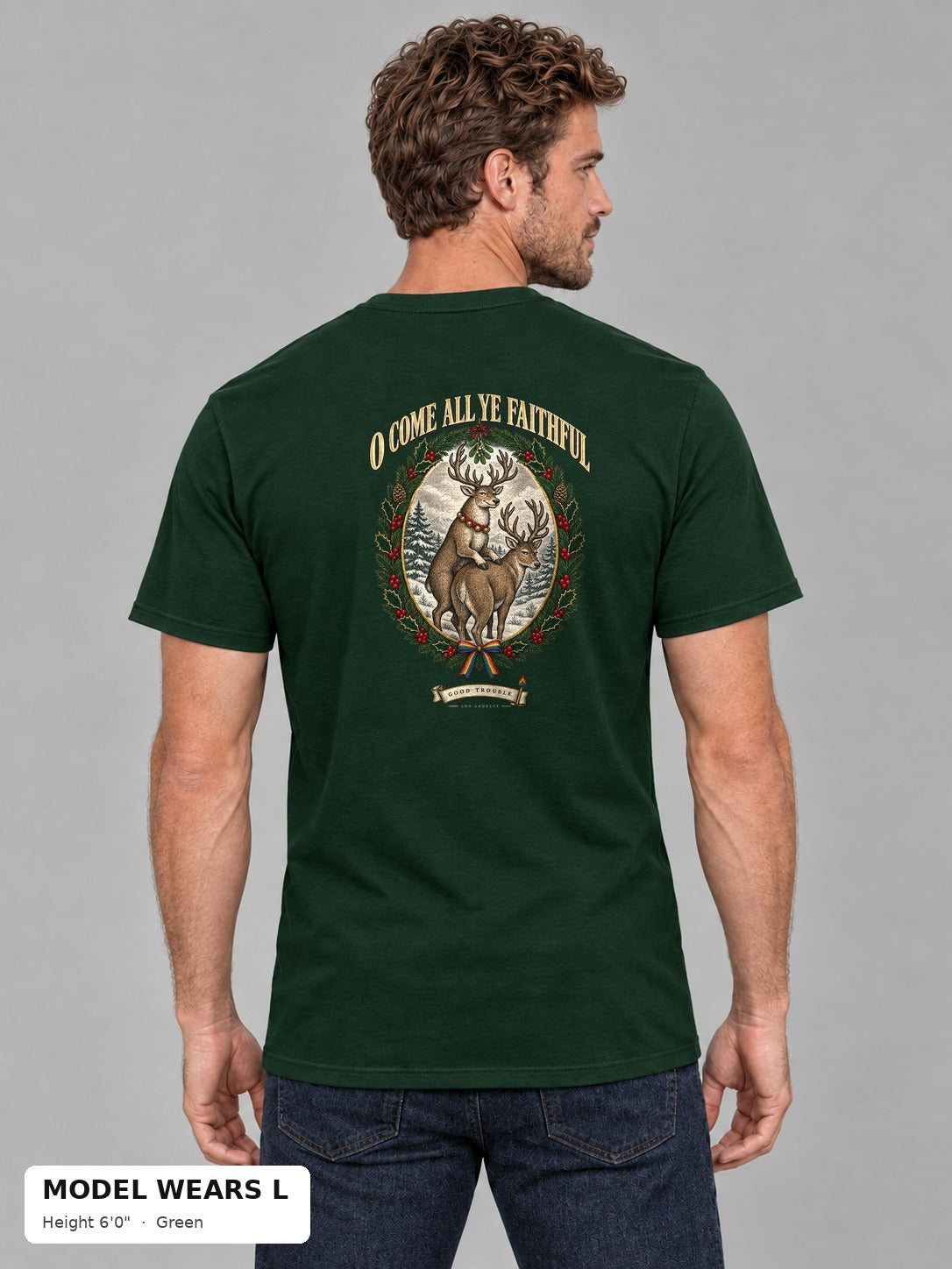 O Come All Ye Faithful Reindeer Tee in Green on an athletic model wearing size L, 6'0" - Good Trouble Fashion