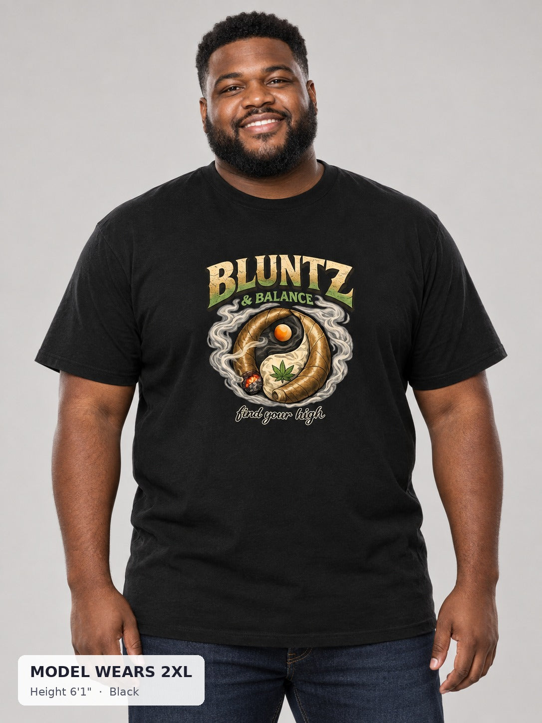 Bluntz and Balance Tee in Black on a plus-size model wearing size 2XL, 6'1" - Good Trouble Fashion