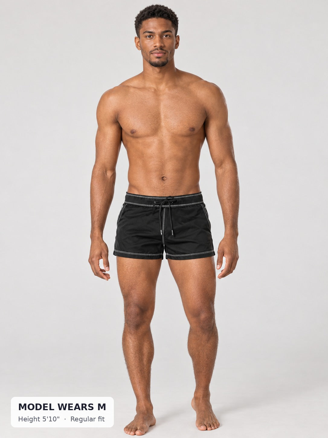 Black CODE 22 Motion Mini Shorts on a model wearing size M, 5'10"