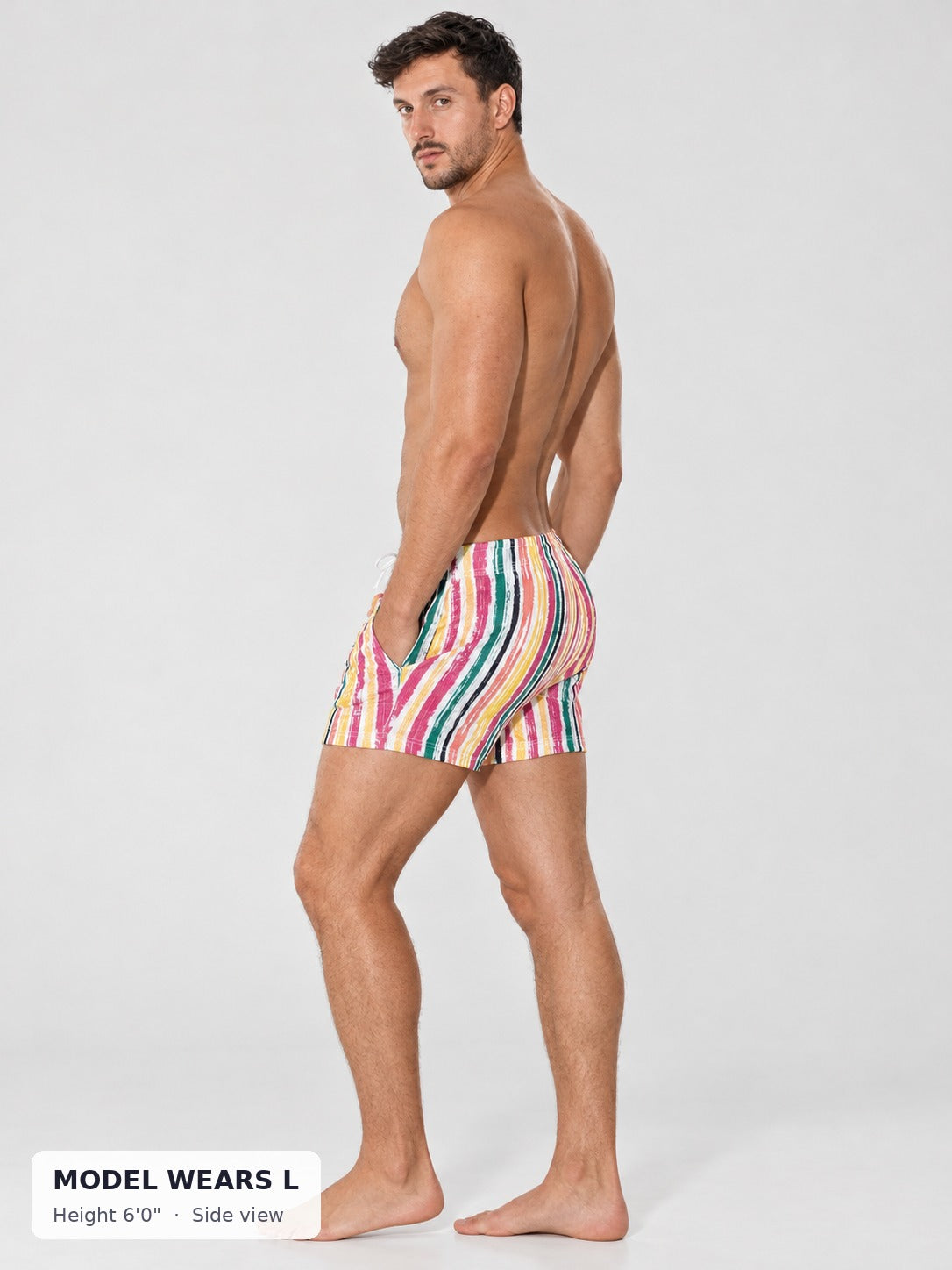 CODE 22 Swim Shorts on an athletic model wearing size L, 6'0", side view