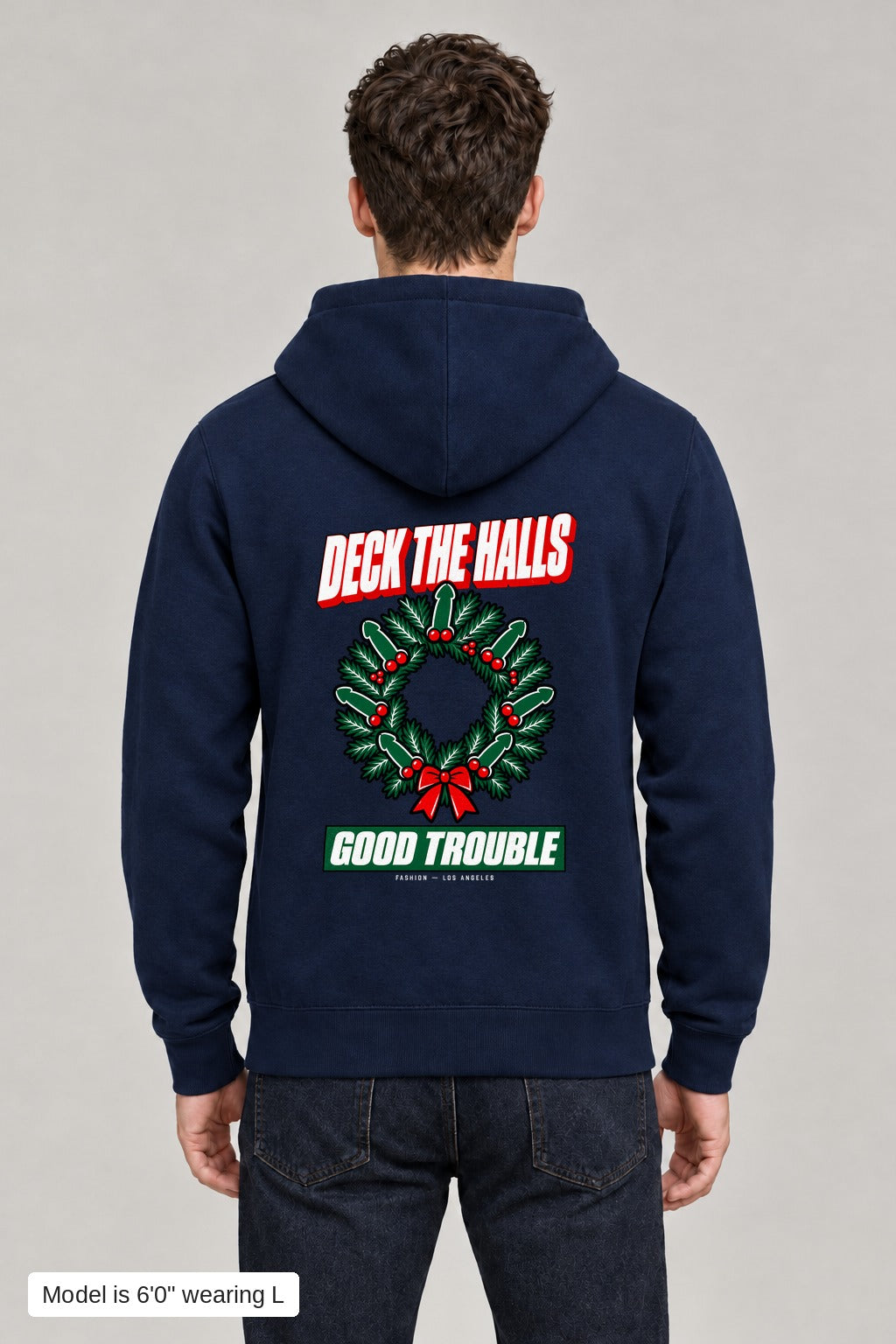 Deck the Halls Hoodie in Navy, back view with Street Bold wreath print, model is 6'0" wearing L