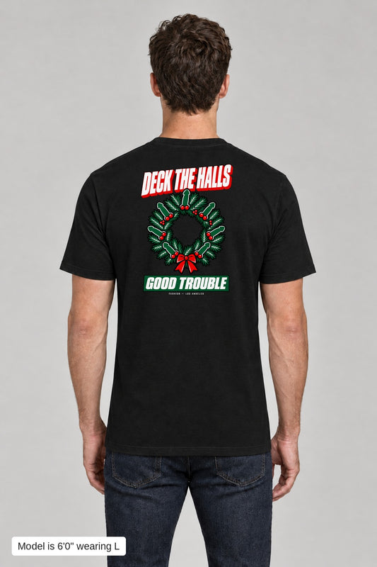Deck the Halls Tee in Black, back view with Street Bold wreath print, model is 6'0" wearing L