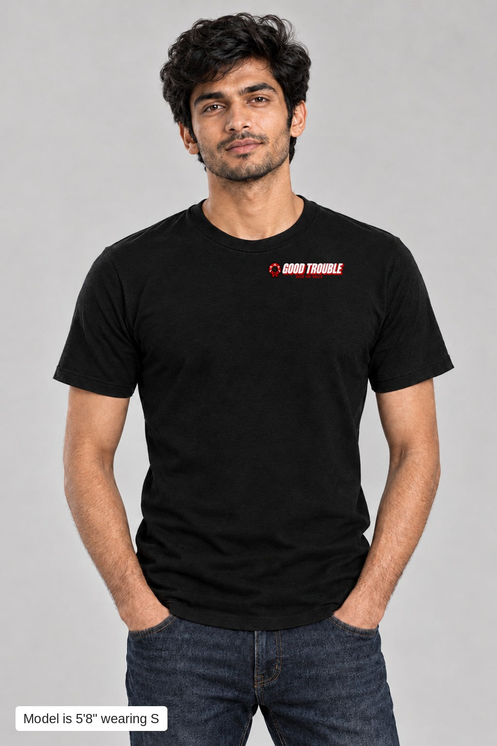 Deck the Halls Tee in Black, front view with Good Trouble chest logo, model is 5'8" wearing S