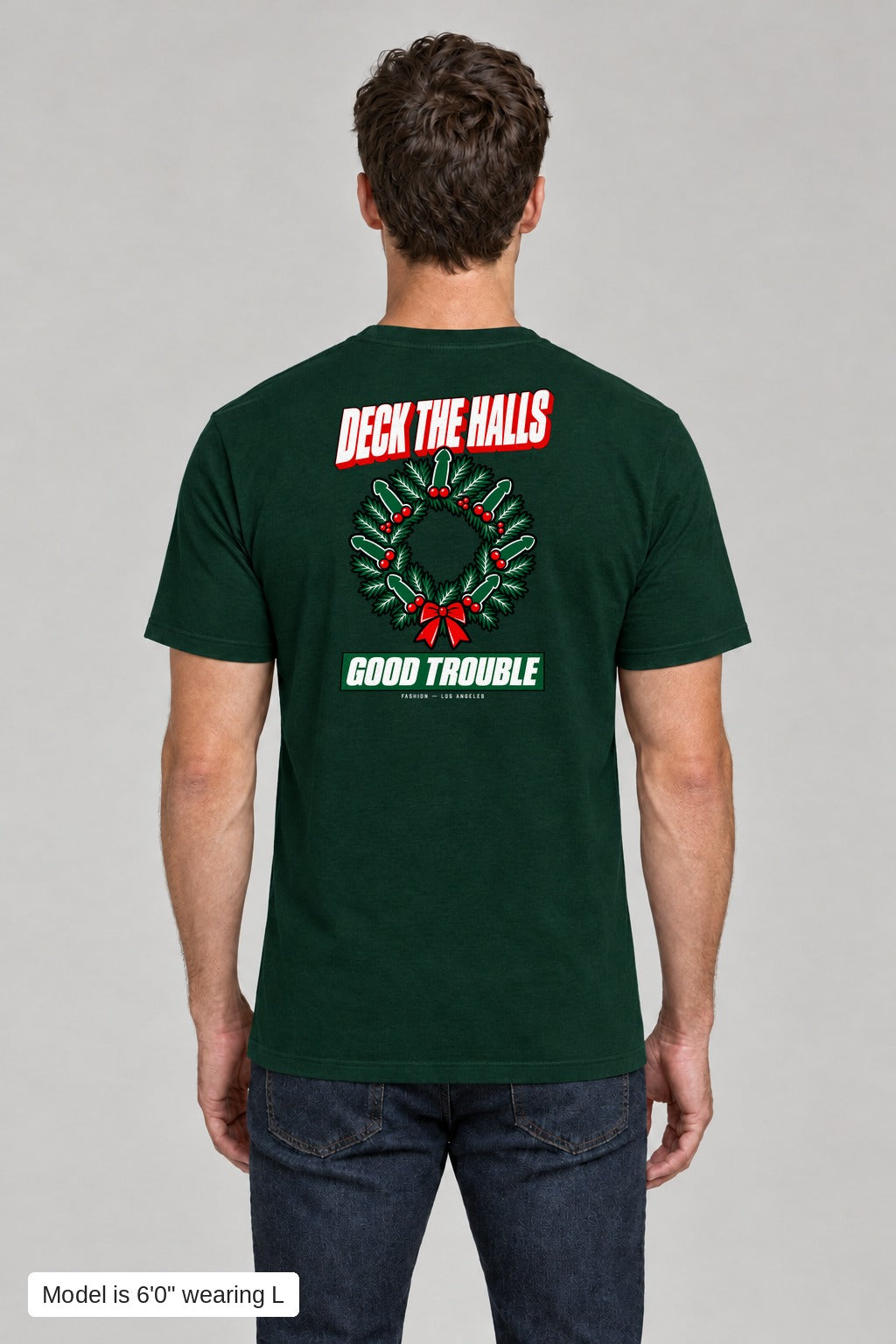 Deck the Halls Tee in Green, back view with Street Bold wreath print, model is 6'0" wearing L