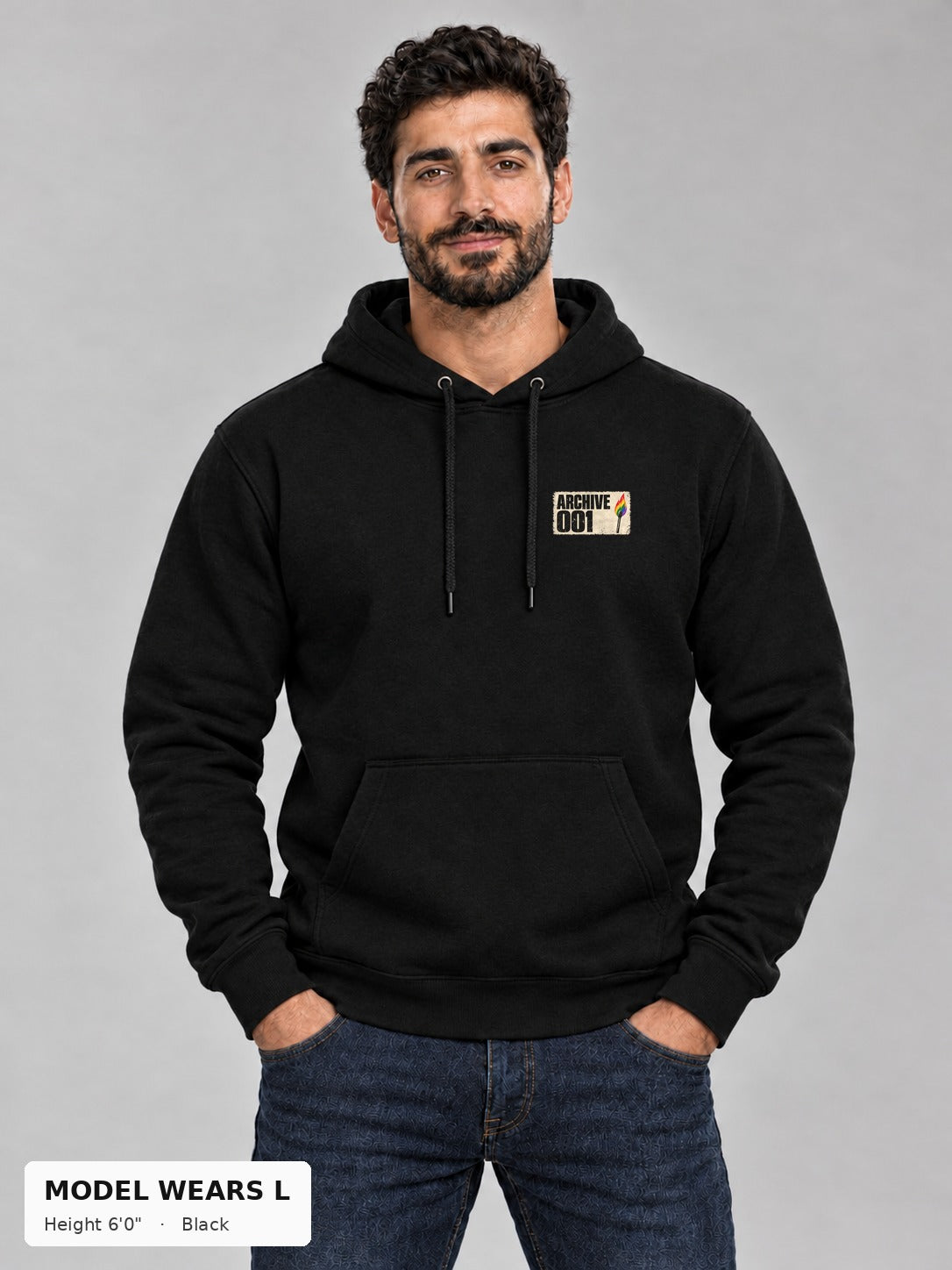 Good Trouble Archive 001 Hoodie in Black, front view showing the ARCHIVE 001 chest stamp, on an athletic model wearing size L, 6'0" - Good Trouble Fashion