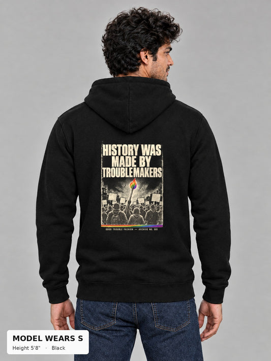 Good Trouble Archive 001 Hoodie in Black, back view showing the HISTORY WAS MADE BY TROUBLEMAKERS poster back print, on a slim model wearing size S, 5'8" - Good Trouble Fashion