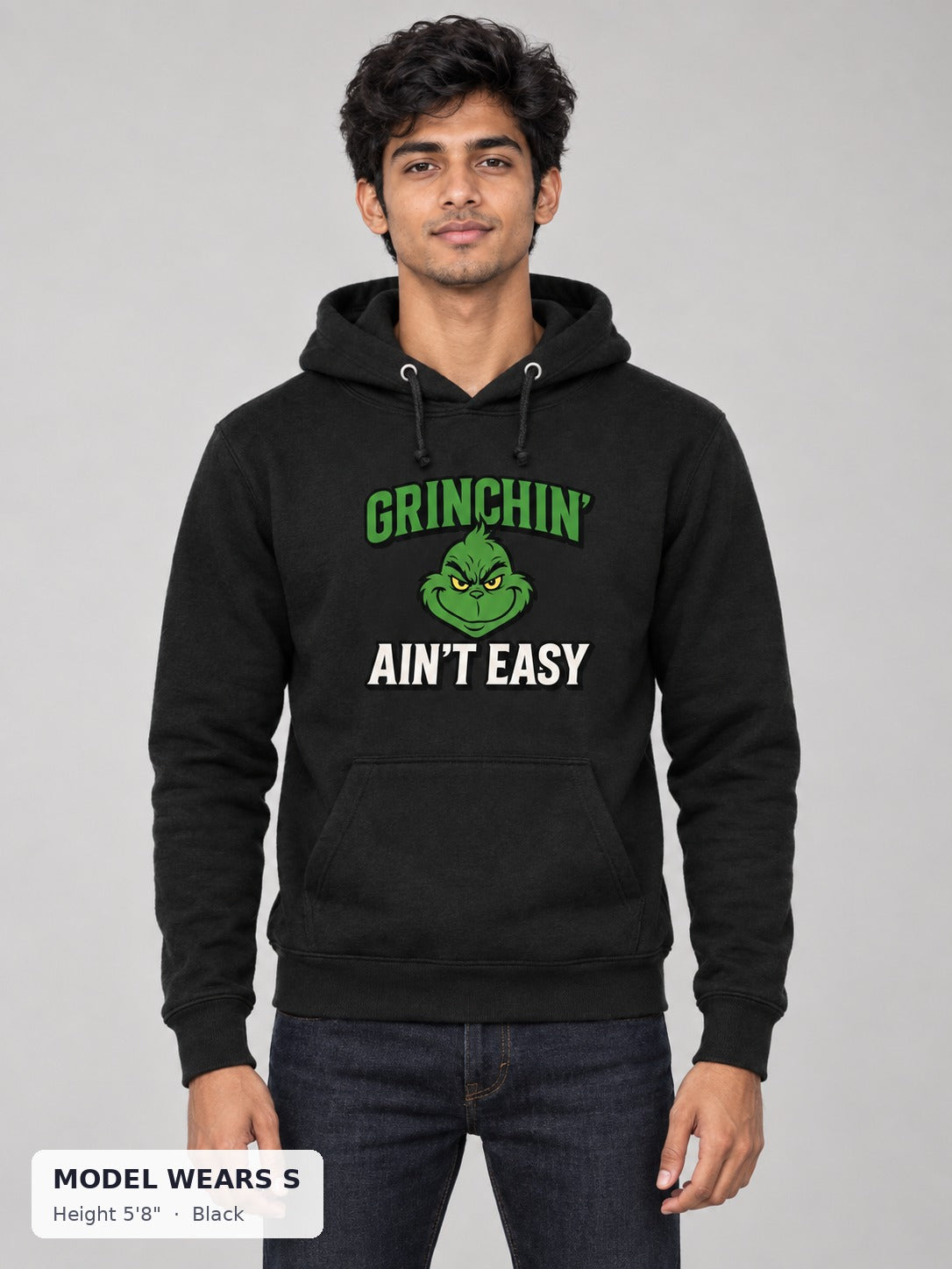 Grinchin' Ain't Easy Hoodie in Black on a slim model wearing size S, 5'8" - Good Trouble Fashion