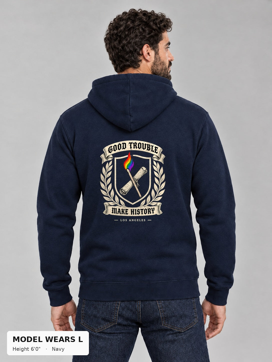 Good Trouble Heritage Crest Hoodie in Navy, back view showing the GOOD TROUBLE Make History crest back print, on an athletic model wearing size L, 6'0" - Good Trouble Fashion