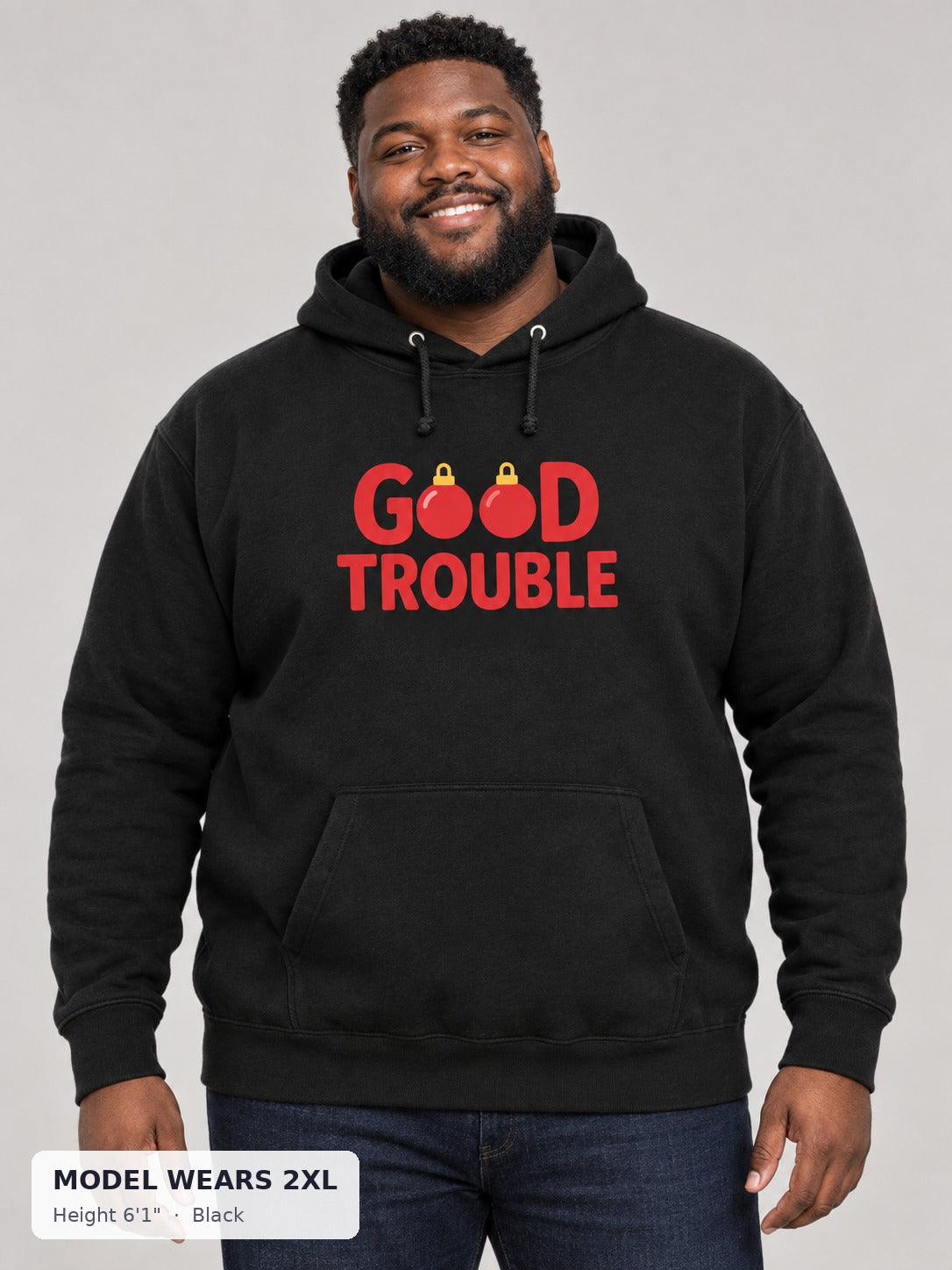 Good Trouble Holiday Hoodie in Black on a plus-size model wearing size 2XL, 6'1" - Good Trouble Fashion