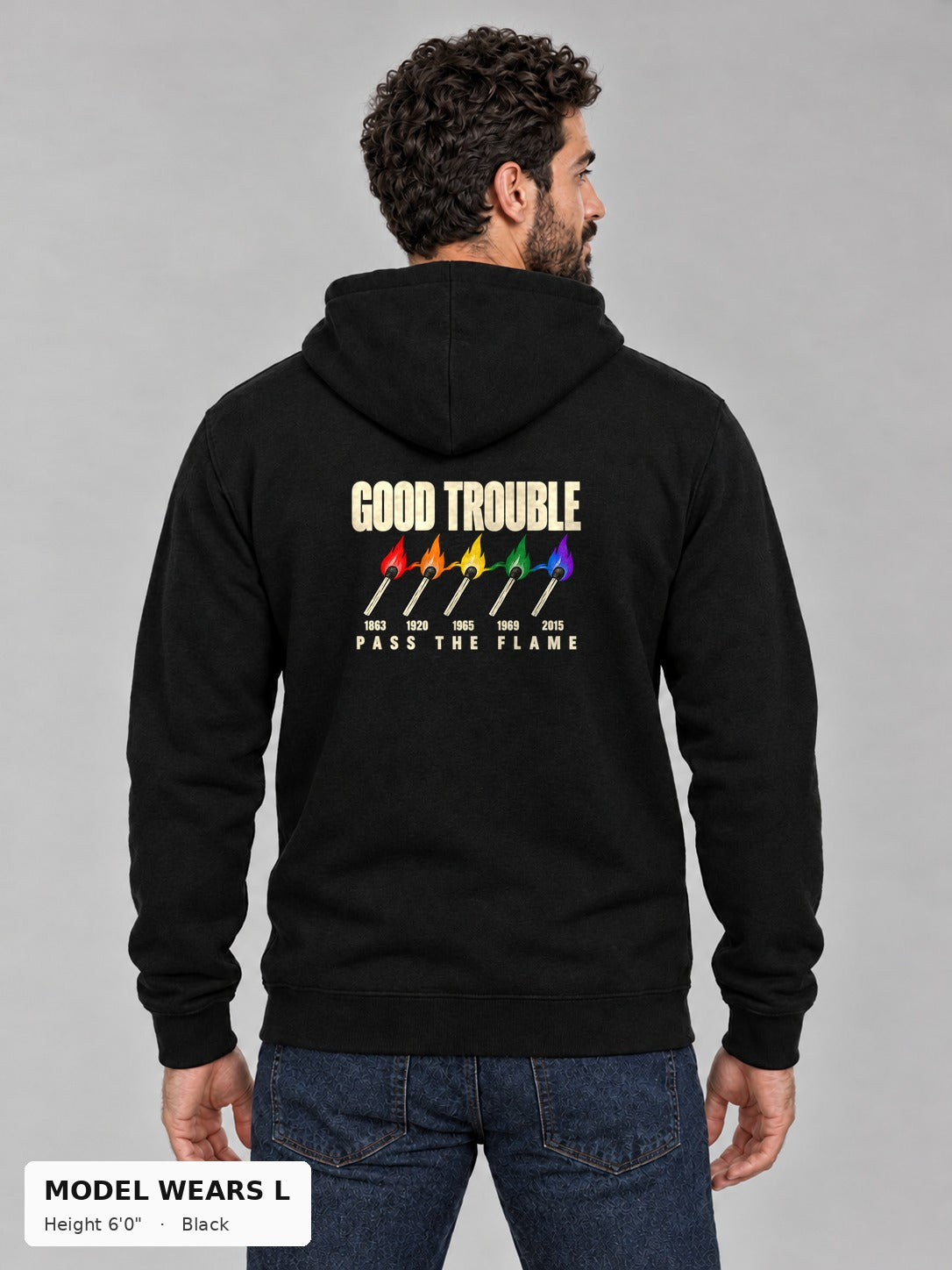 Good Trouble Pass the Flame Hoodie in Black, back view showing the PASS THE FLAME five-match back print, on an athletic model wearing size L, 6'0" - Good Trouble Fashion