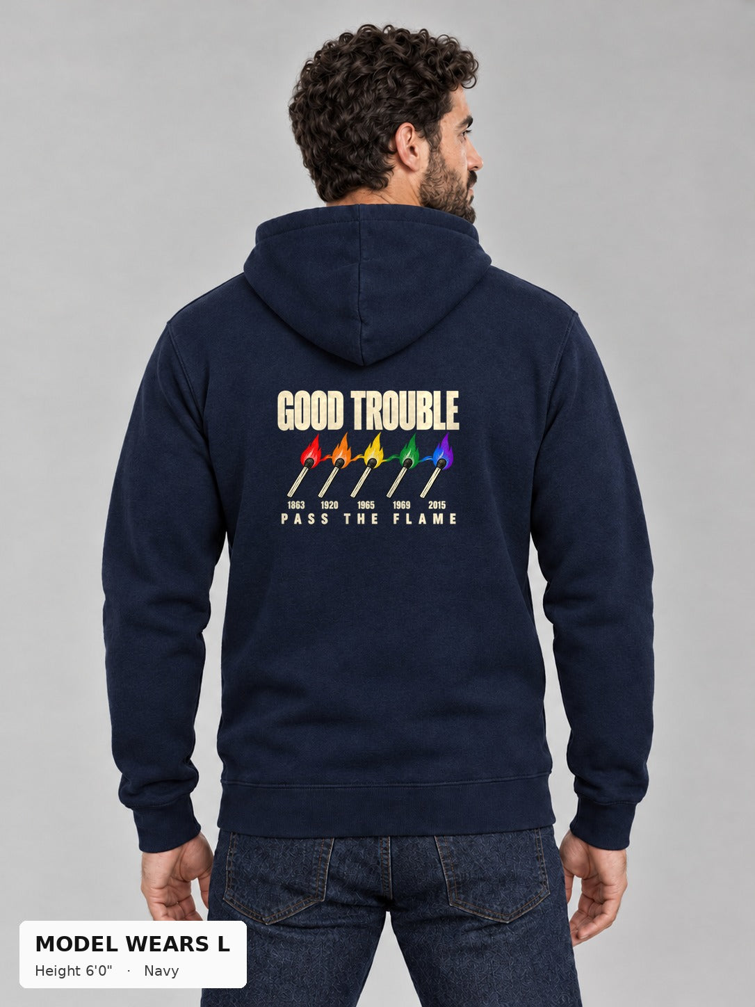 Good Trouble Pass the Flame Hoodie in Navy, back view showing the PASS THE FLAME five-match back print, on an athletic model wearing size L, 6'0" - Good Trouble Fashion