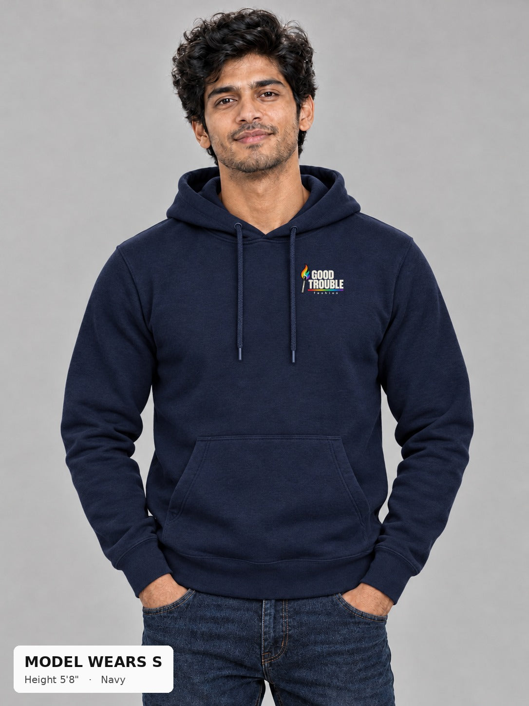 Good Trouble Spark Hoodie in Navy, front view showing the left-chest match logo, on a slim model wearing size S, 5'8" - Good Trouble Fashion