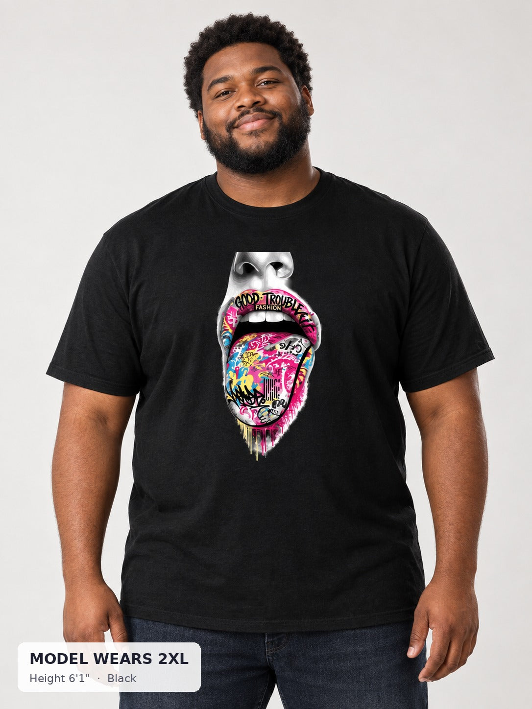Graffiti Tongue Tee in Black on a plus-size model wearing size 2XL, 6'1" - Good Trouble Fashion