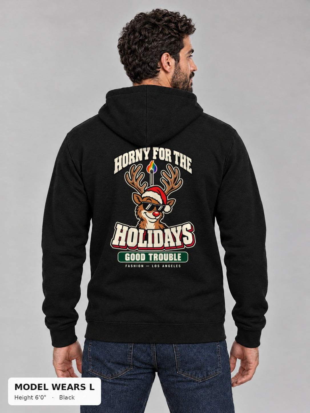 Horny for the Holidays Hoodie in Black, back view showing the HORNY FOR THE HOLIDAYS reindeer back print, on an athletic model wearing size L, 6'0" - Good Trouble Fashion