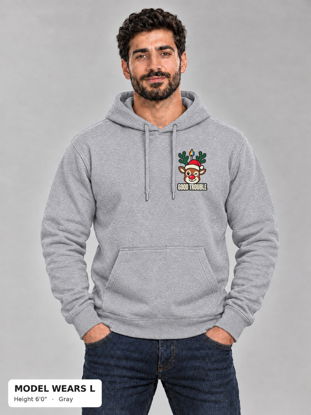 Horny for the Holidays Hoodie in Gray, front view showing the left-chest winking reindeer logo, on an athletic model wearing size L, 6'0" - Good Trouble Fashion