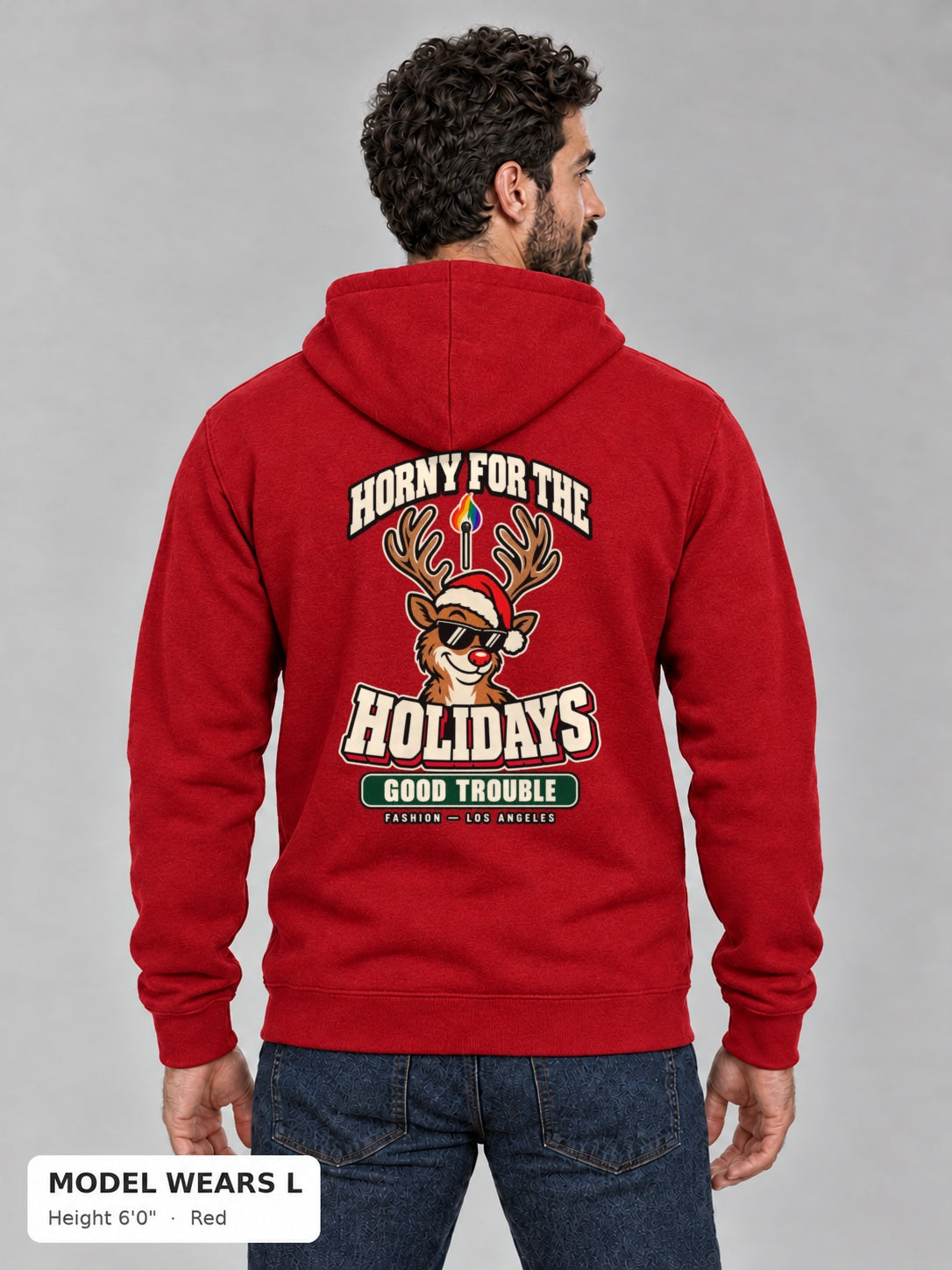 Horny for the Holidays Hoodie in Red, back view showing the HORNY FOR THE HOLIDAYS reindeer back print, on an athletic model wearing size L, 6'0" - Good Trouble Fashion
