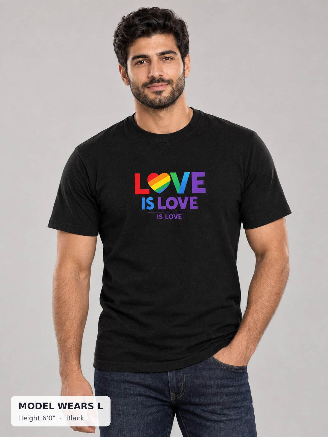 Love Is Love Rainbow Heart Tee in Black on an athletic model wearing size L, 6'0" - Good Trouble Fashion