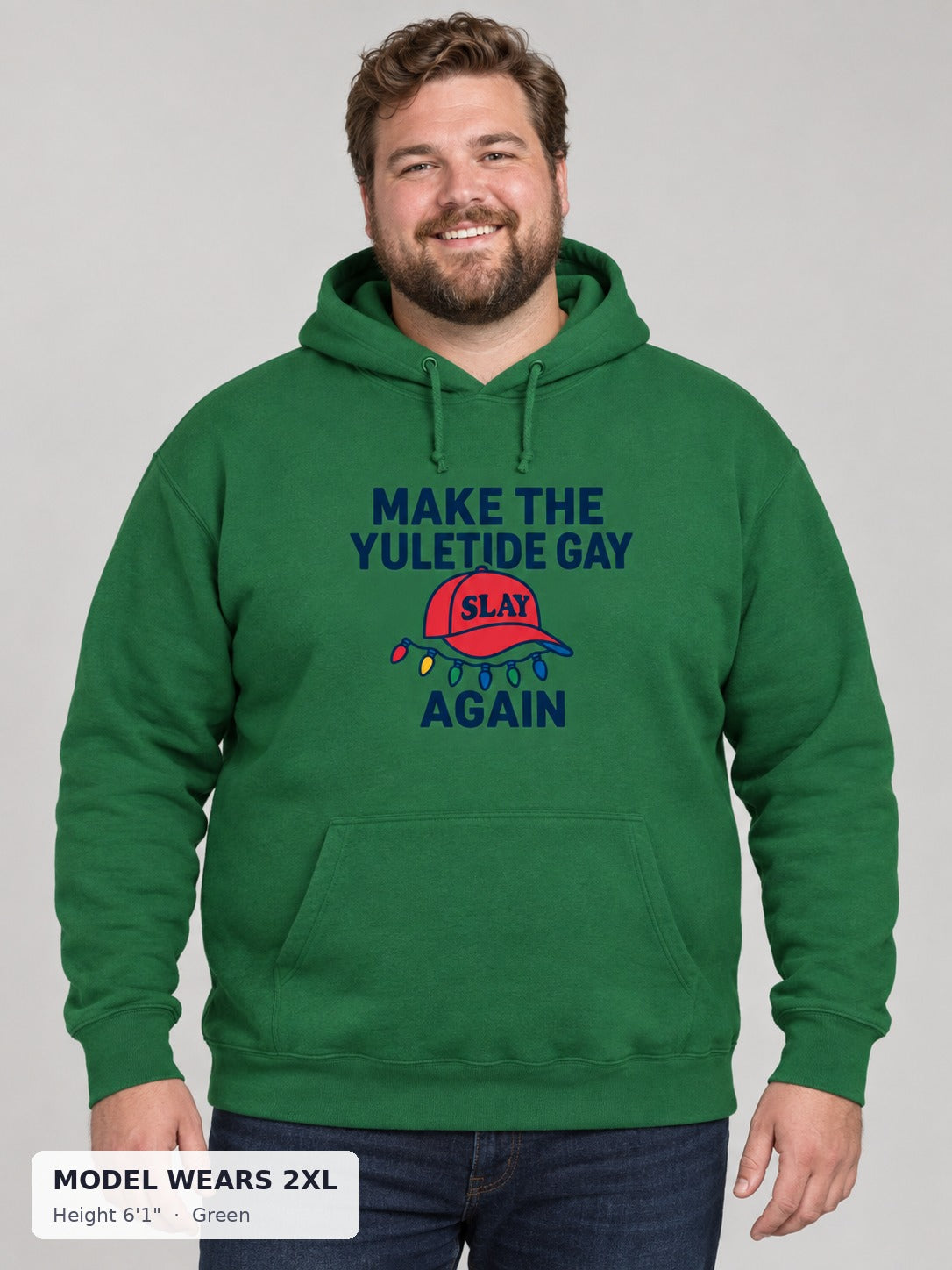 Make the Yuletide Gay Hoodie in Green on a plus-size model wearing size 2XL, 6'1" - Good Trouble Fashion