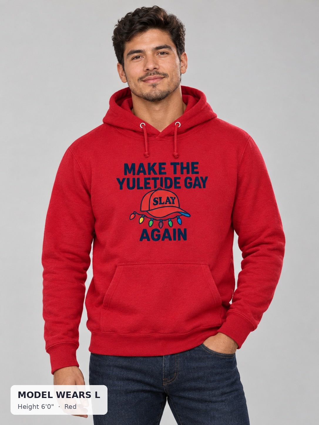 Make the Yuletide Gay Hoodie in Red on an athletic model wearing size L, 6'0" - Good Trouble Fashion