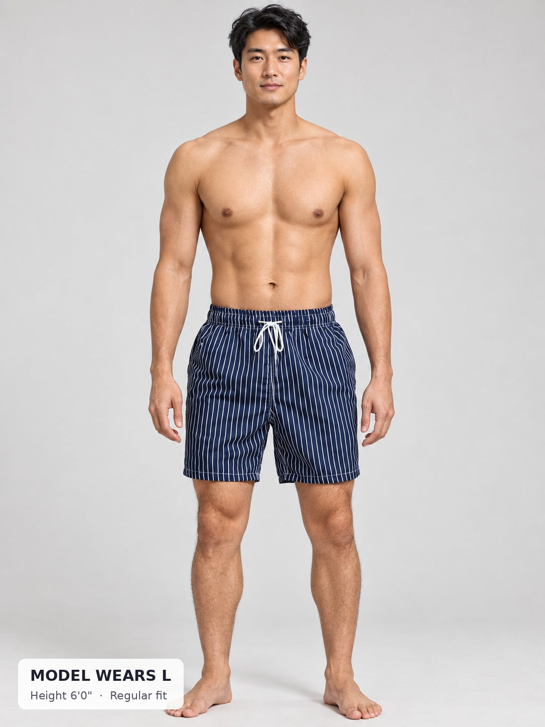 CODE 22 Striped Swim Shorts on an athletic model wearing size L, 6'0"