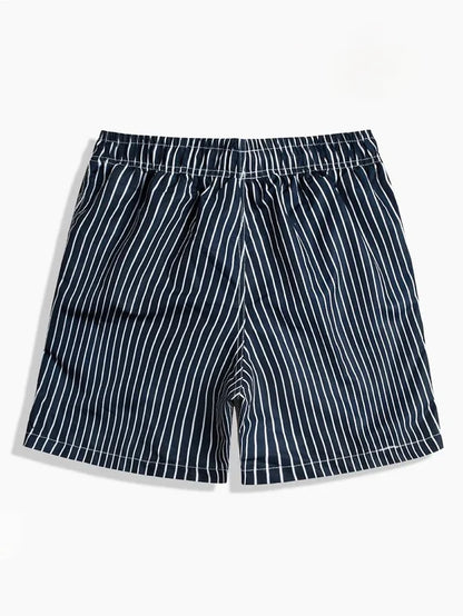 GOOD TROUBLE FASHION men's striped swim shorts in navy with white vertical stripes and elastic waistband