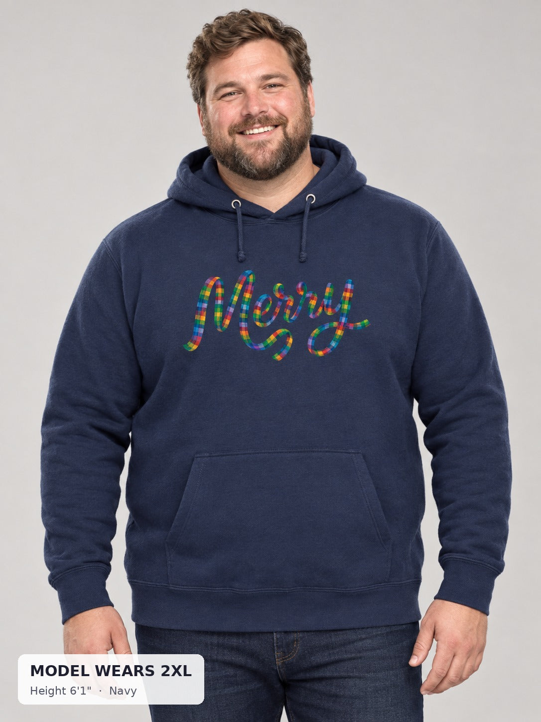 Merry and Bright Holiday Hoodie in Navy on a plus-size model wearing size 2XL, 6'1" - Good Trouble Fashion