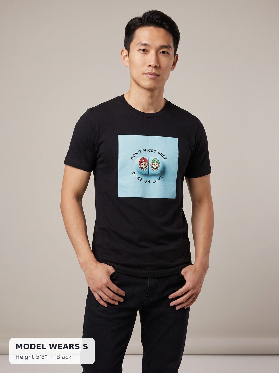 Micro Dose Love Tee in Black on a slim model wearing size S, 5'8" - Good Trouble Fashion