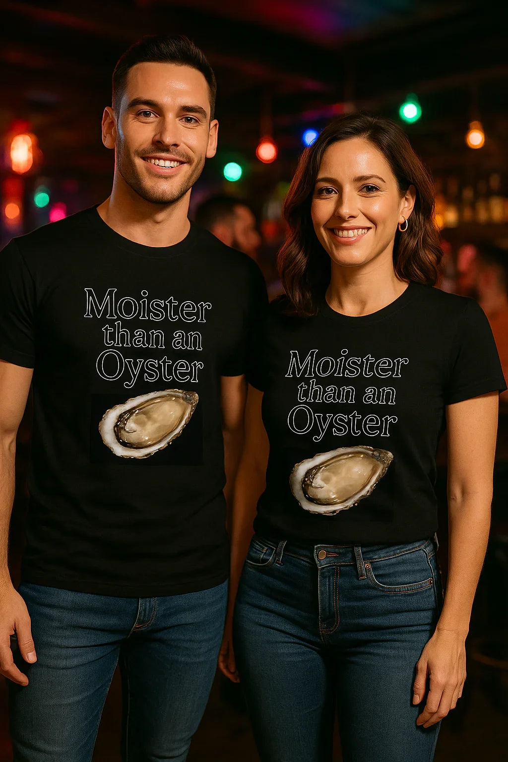 Man and woman wearing Good Trouble Garments moister than an oyster tee black shirts with oyster graphic