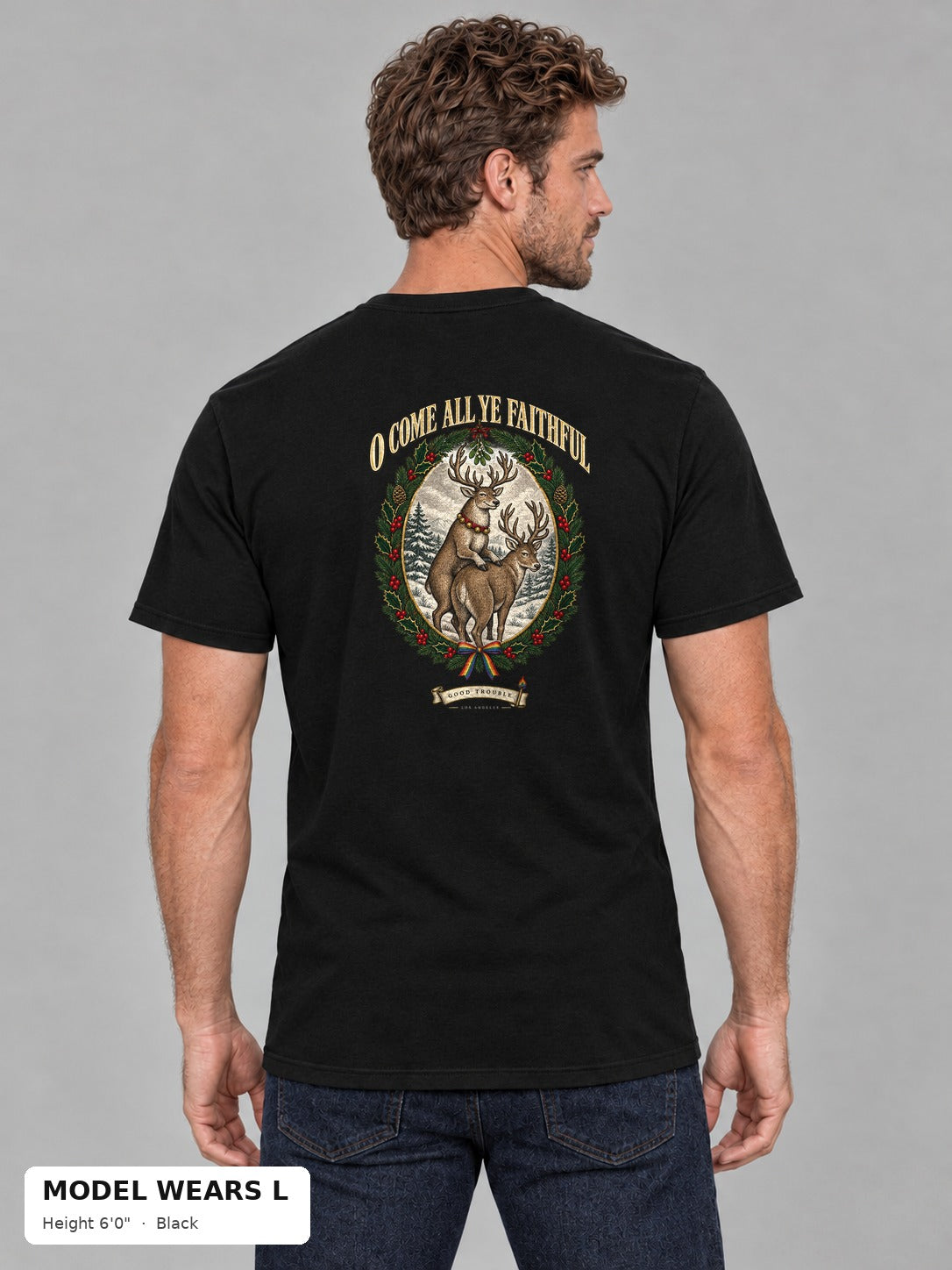 O Come All Ye Faithful Reindeer Tee in Black on an athletic model wearing size L, 6'0" - Good Trouble Fashion