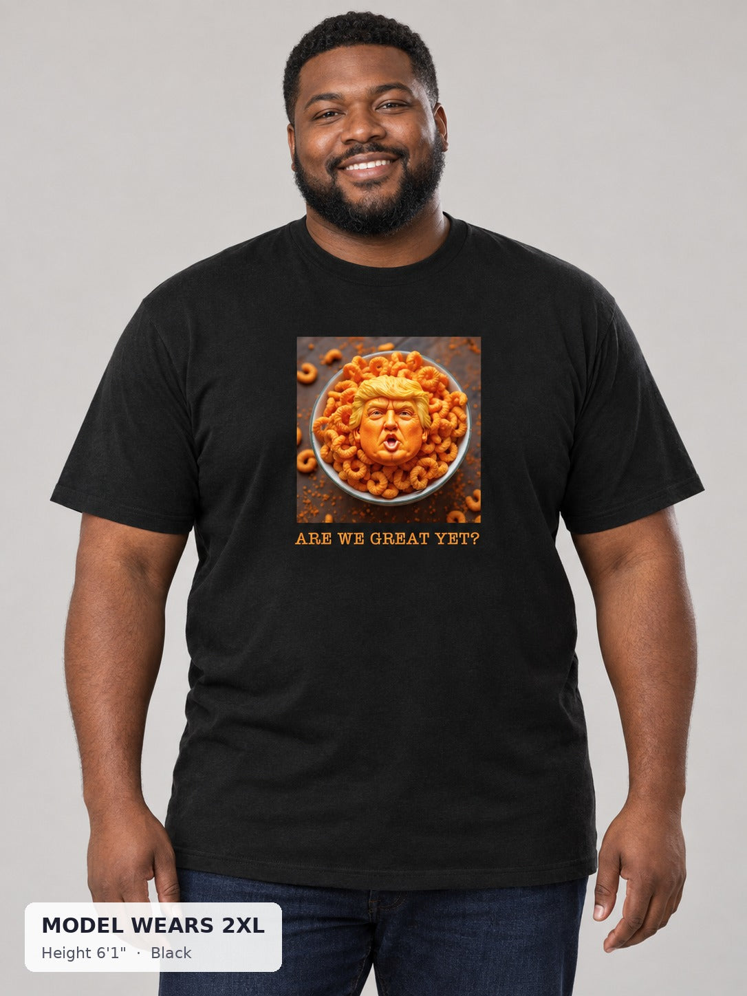 Orange Trump Parody Tee in Black on a plus-size model wearing size 2XL, 6'1" - Good Trouble Fashion