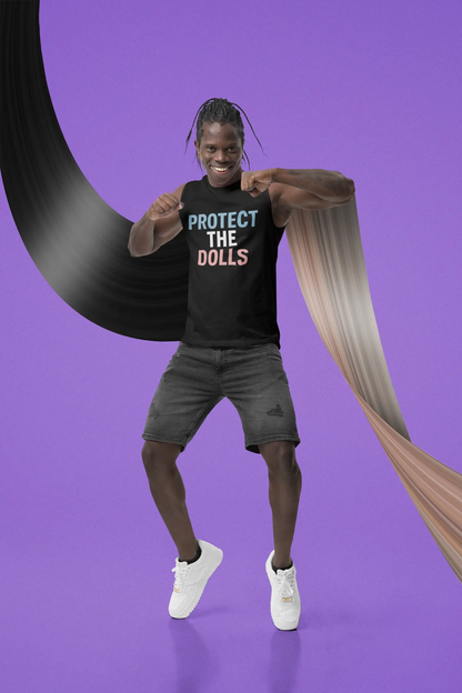 Man wearing black Protect the Dolls LGBTQ shirt with casual shorts and white sneakers on purple background