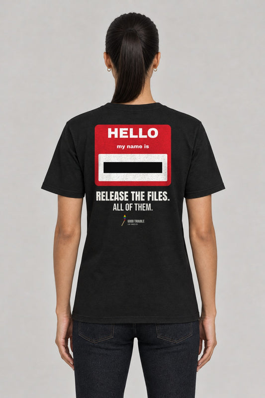 Redacted Name Tag Epstein Files Tee in Black, back view showing the redacted HELLO my name is back print, on a slim model wearing size S, 5'8" - Good Trouble Fashion