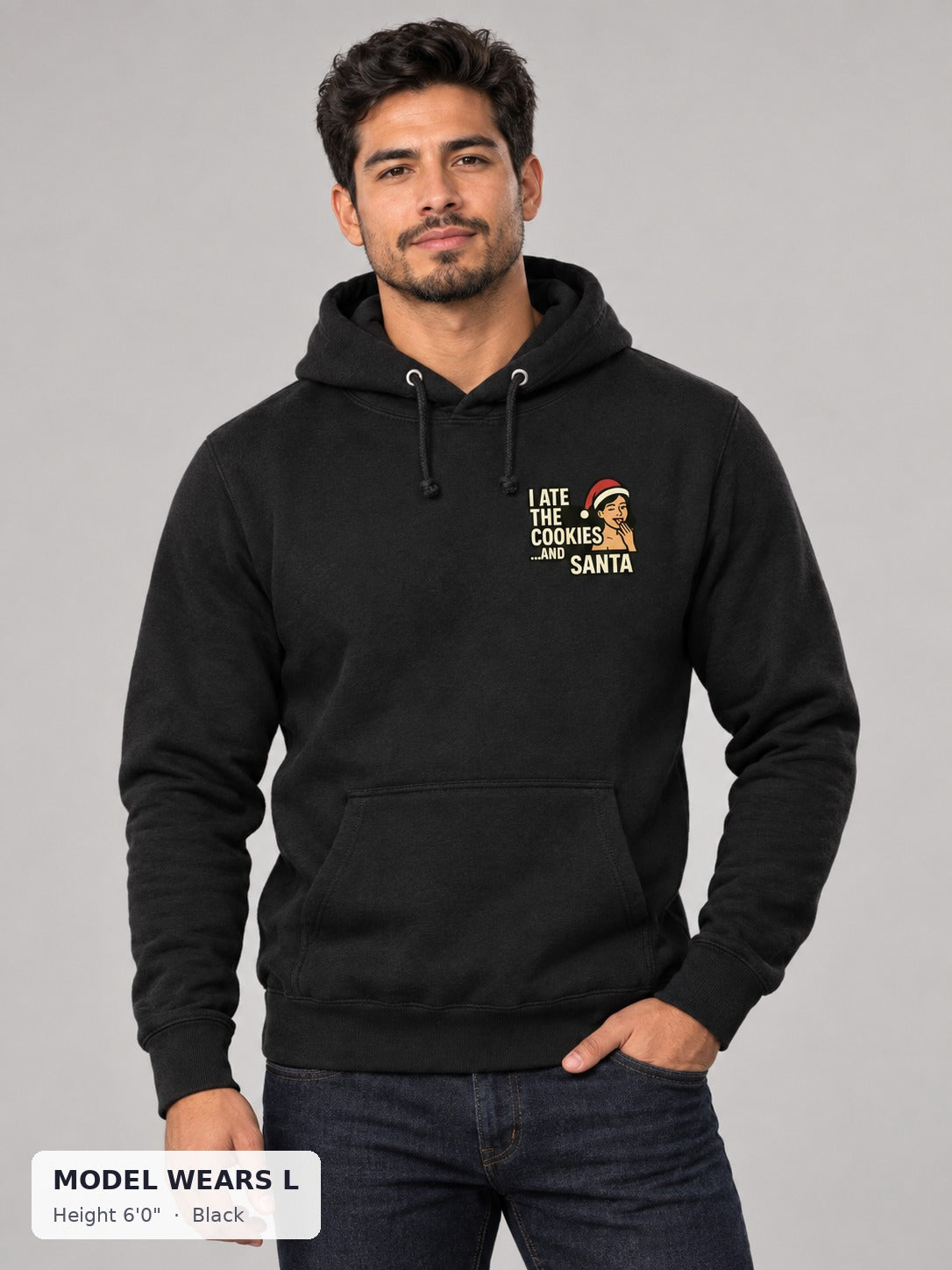 Santa and His Cookies Holiday Hoodie in Black on an athletic model wearing size L, 6'0" - Good Trouble Fashion