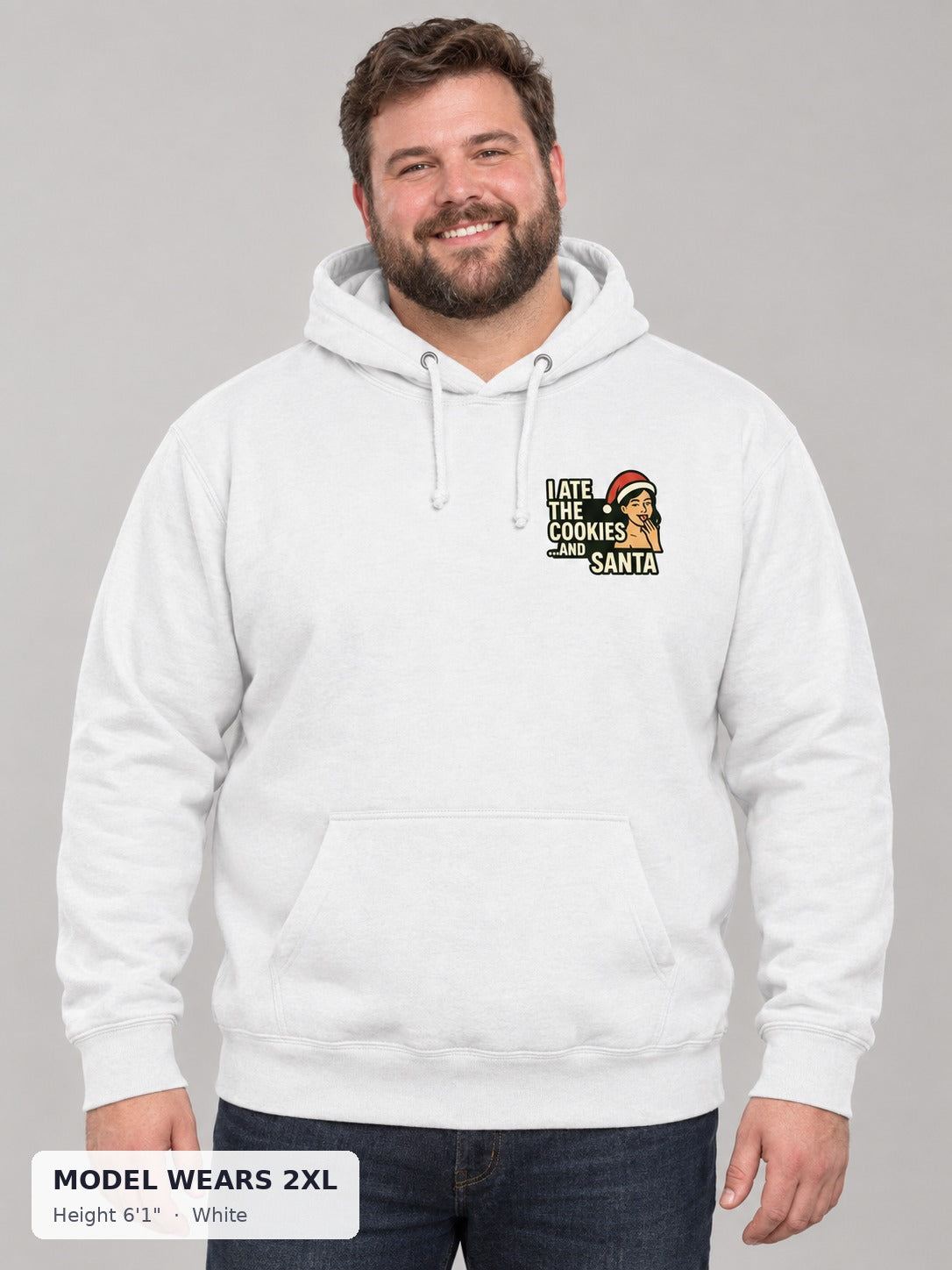 Santa and His Cookies Holiday Hoodie in White on a plus-size model wearing size 2XL, 6'1" - Good Trouble Fashion