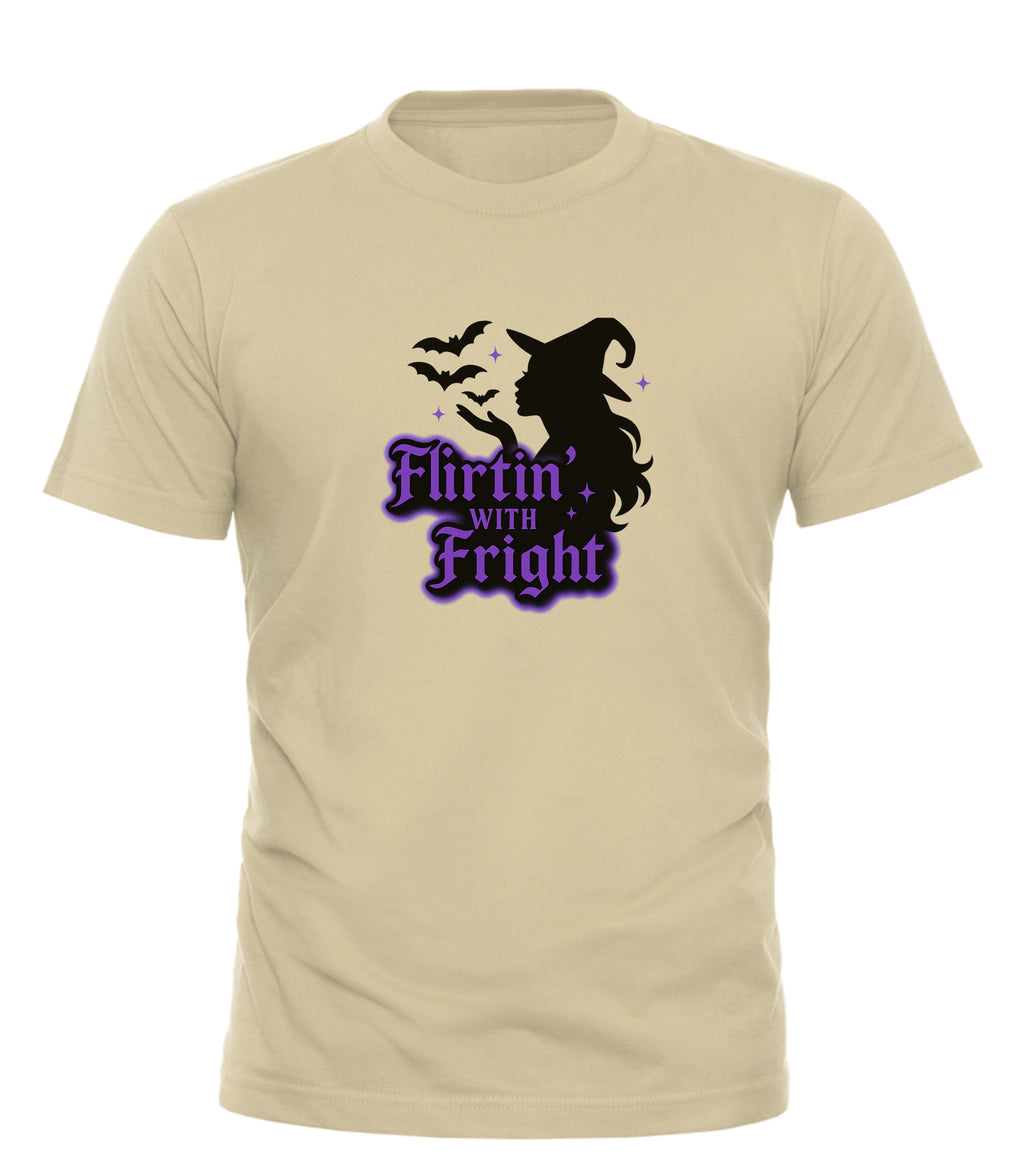 Flirting With Fright t-shirt beige cotton tee with black witch silhouette purple gothic text and flying bats