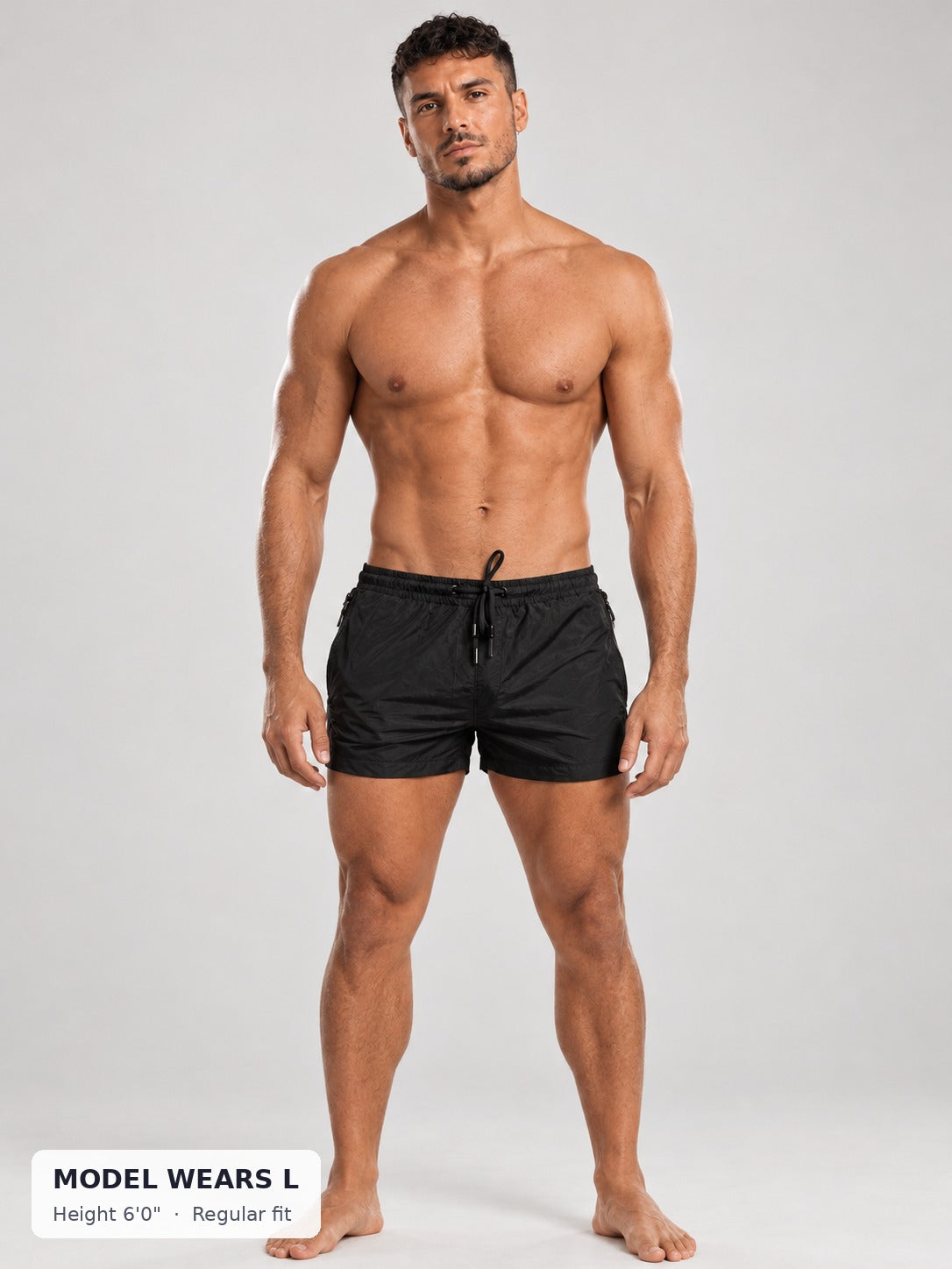 CODE 22 Solid Swim Trunks on an athletic model wearing size L, 6'0"