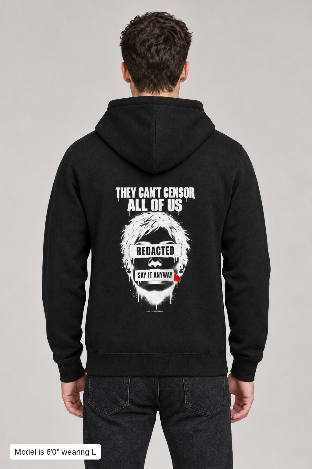 They Can't Censor All of Us Hoodie in Black, back, censored stencil face print below the hood, on an athletic model wearing size L, 6'0" - Good Trouble Fashion