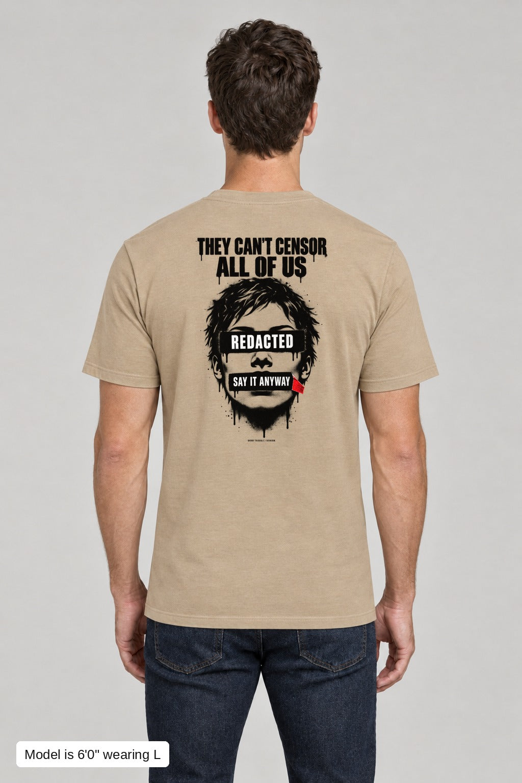 They Can't Censor All of Us Tee in Khaki, back, black-ink censored face print, on an athletic model wearing size L, 6'0" - Good Trouble Fashion
