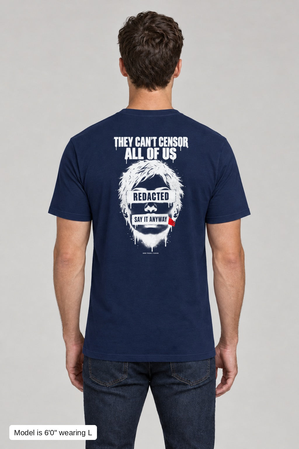 They Can't Censor All of Us Tee in Navy, back, white-ink censored face print, on an athletic model wearing size L, 6'0" - Good Trouble Fashion